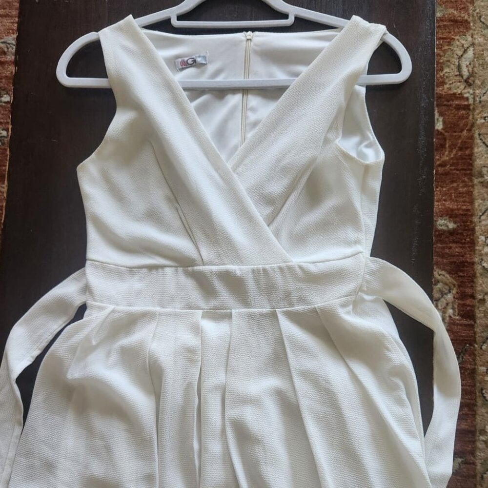 Beautiful A-line dress with flare- lovely white dress and works for bridal showe